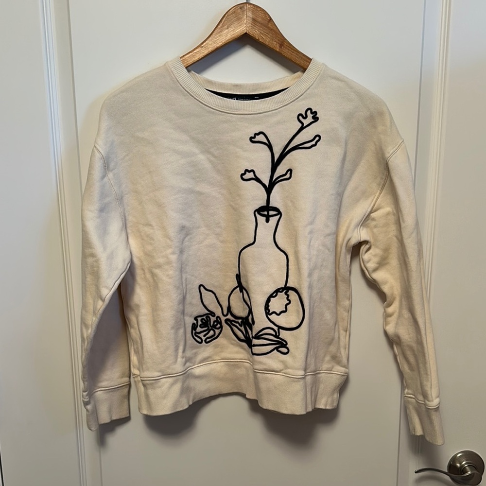 Cream Sweater with Artistic Design